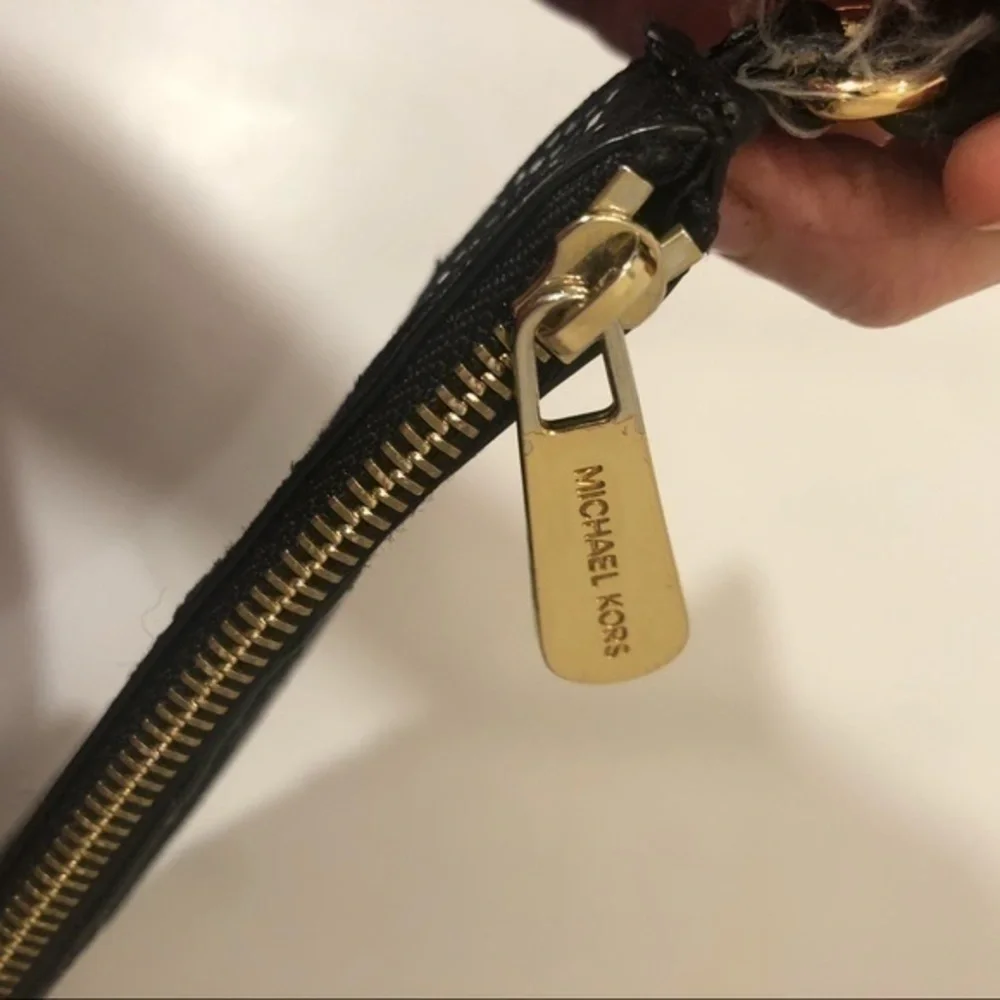 Michael kors black chevron multi texture wristlet